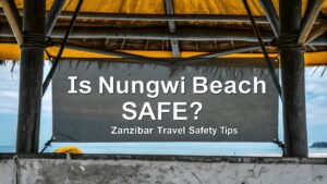 Tourists walking on Nungwi Beach Zanzibar, a safe and peaceful destination for travelers
