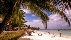 Visit Nungwi Beach Zanzibar with white sandy shore and clear turquoise water